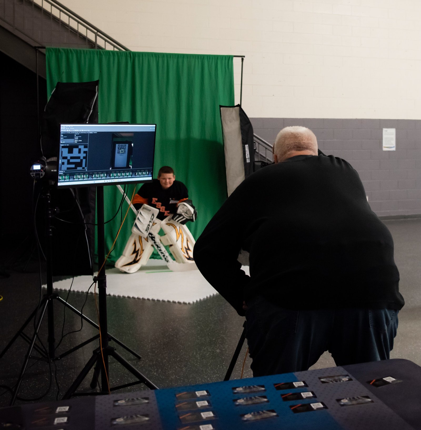 DraftPics photographer capturing a hockey athlete on PhotoDay